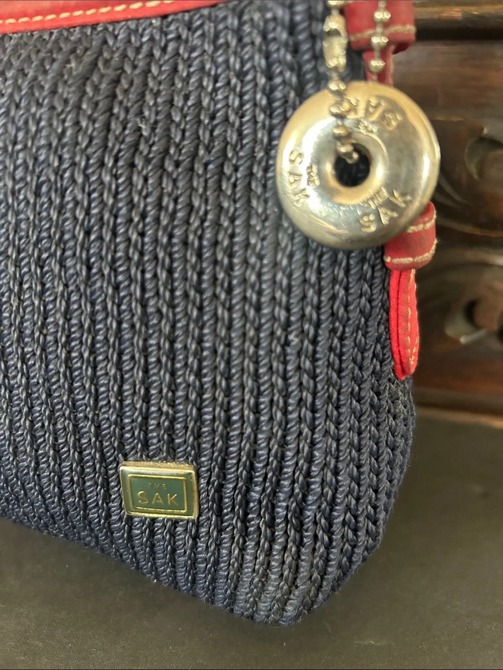 The Sak Navy Blue Crochet Woven Shoulder Bag with Red Trim